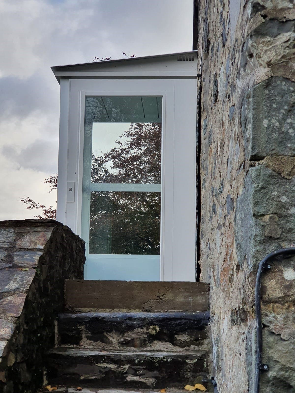 Stairs leading to outdoor home lift