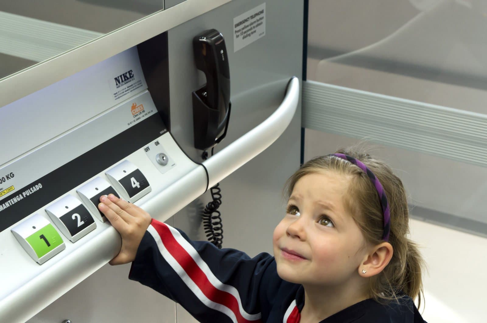 Child in platform lift in school