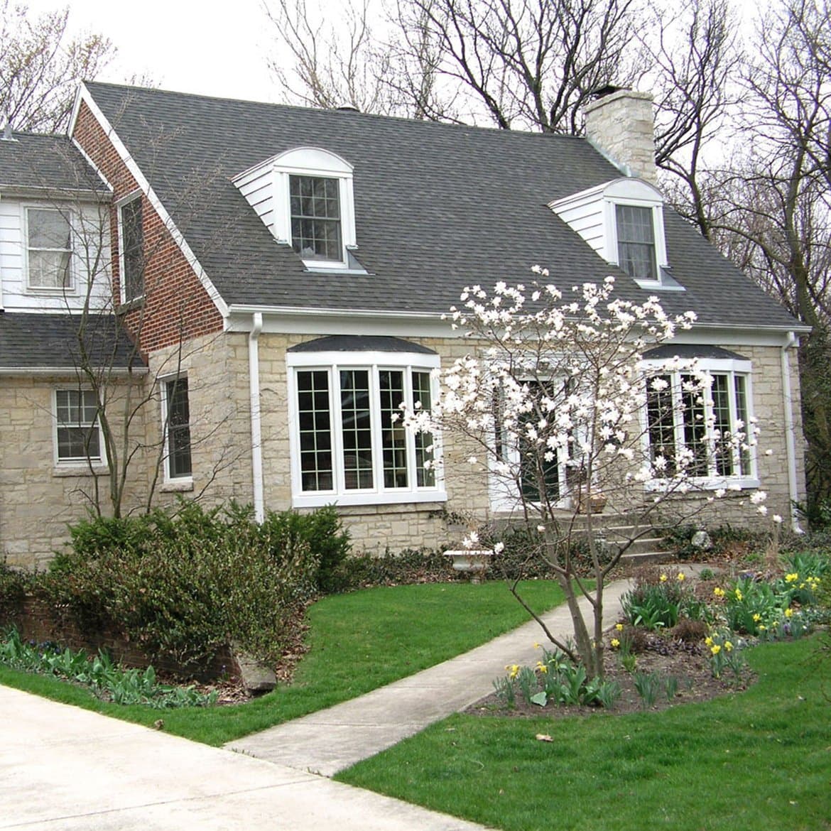 Cottage with cherry blossom tree
