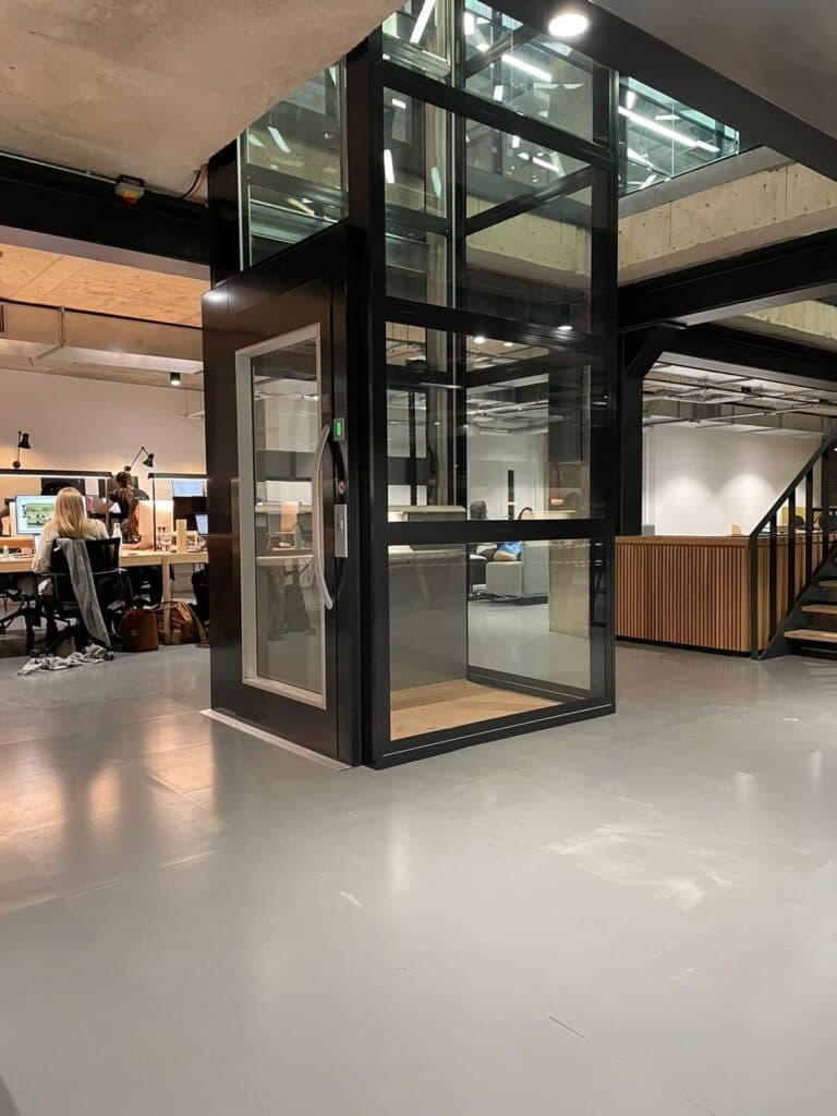 5 inspiring lift installations in office buildings - Cibes Global